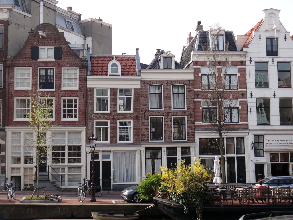 amsterda casas coloridas 1024x768 - O que fazer em Amsterdam: super roteiro de viagem de 3 dias para você.