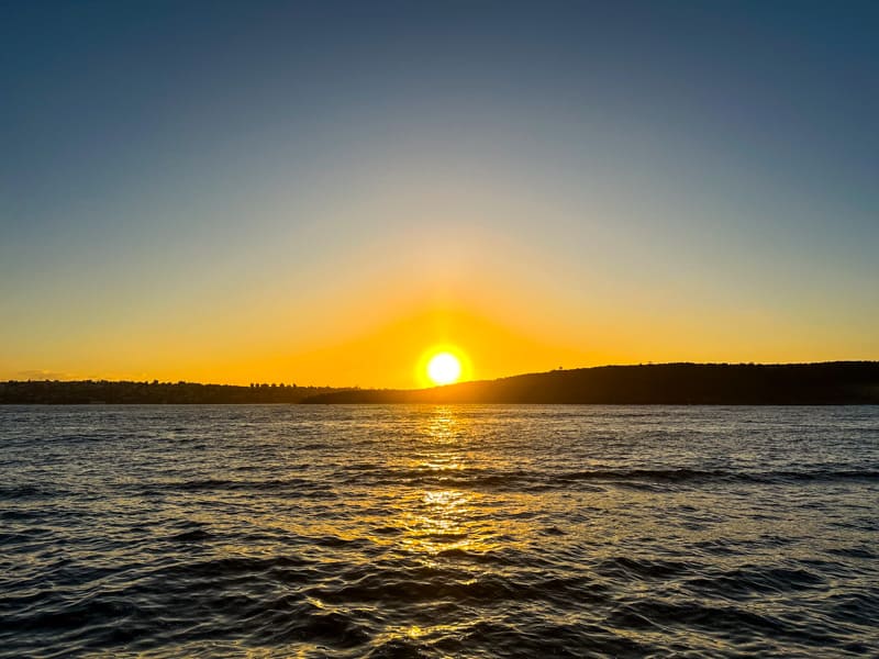 por do sol passeio barco baia Sydney  roteiro lets fly away